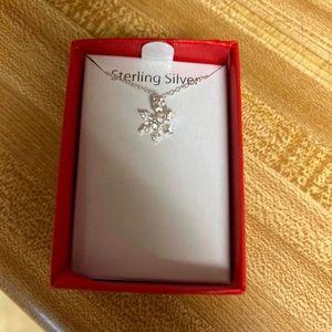 Sterling silver snowflake necklace.